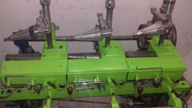 ENCONADORA MARCA SCHWITER , TRES HUSOS PARA CONO 9/15V O 5/57